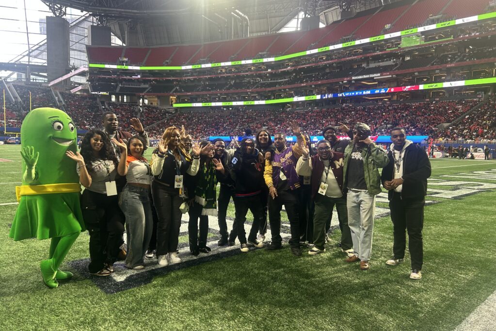 Cricket Wireless HBCU Campus Ambassadors on the field at the 2024 Celebration Bowl